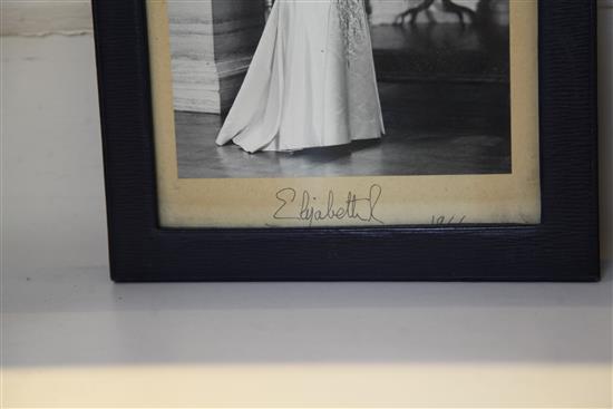 Royal Interest: Two leather framed signed photographs of Queen Elizabeth II and Prince Philip, dated 1966 frames 12.5in. high